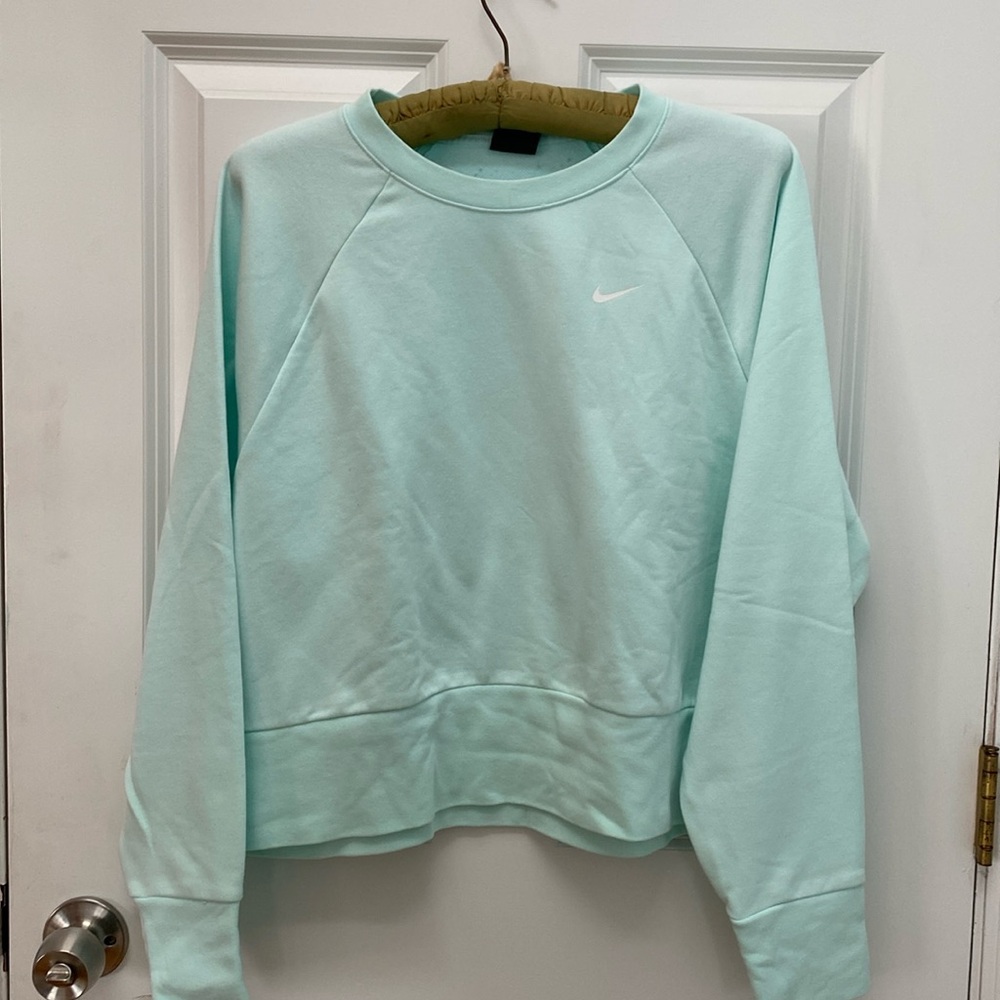 Nike Dri-Fit sweat shirt with back vents. Size Lg